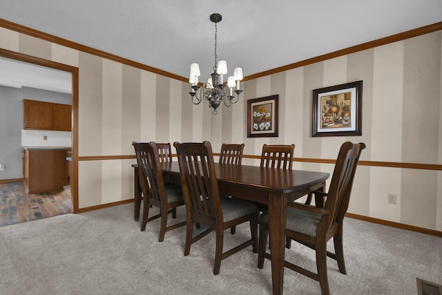 dining space featuring wallpapered walls, baseboards, and light carpet