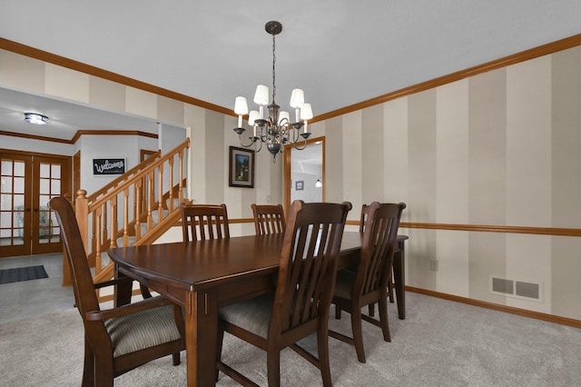 dining area with visible vents, stairway, carpet floors, french doors, and baseboards