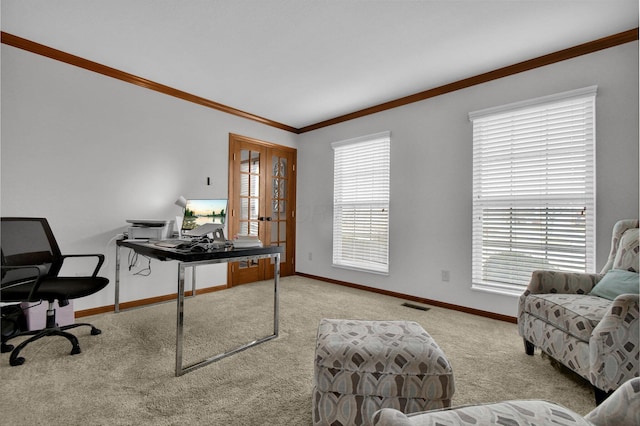 home office featuring visible vents, carpet flooring, baseboards, and ornamental molding