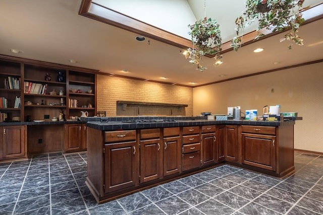 kitchen with recessed lighting, gas stovetop, ornamental molding, tile counters, and open shelves