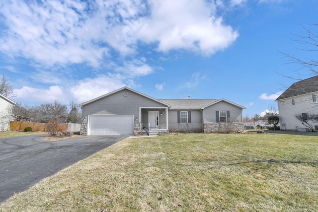 ranch-style house featuring a front lawn, aphalt driveway, stone siding, fence, and an attached garage