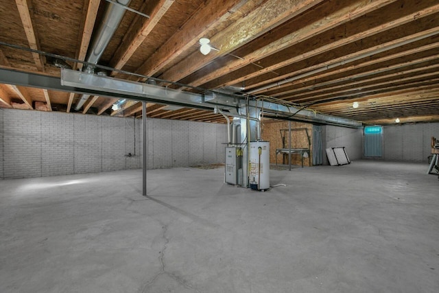 unfinished basement featuring water heater