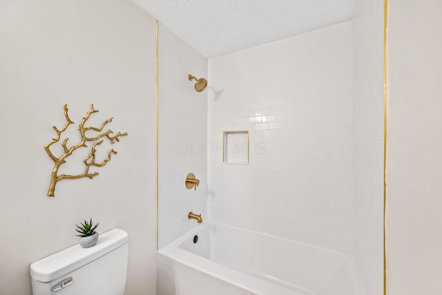 full bath featuring a textured ceiling, bathing tub / shower combination, and toilet