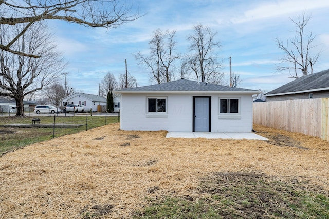 view of outdoor structure with an outbuilding and a fenced backyard