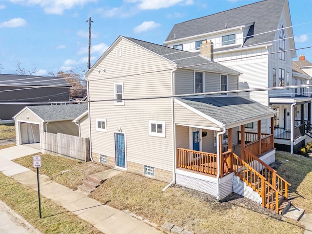 view of side of home featuring a garage, a porch, and a shingled roof