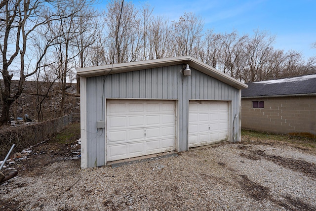 detached garage with fence