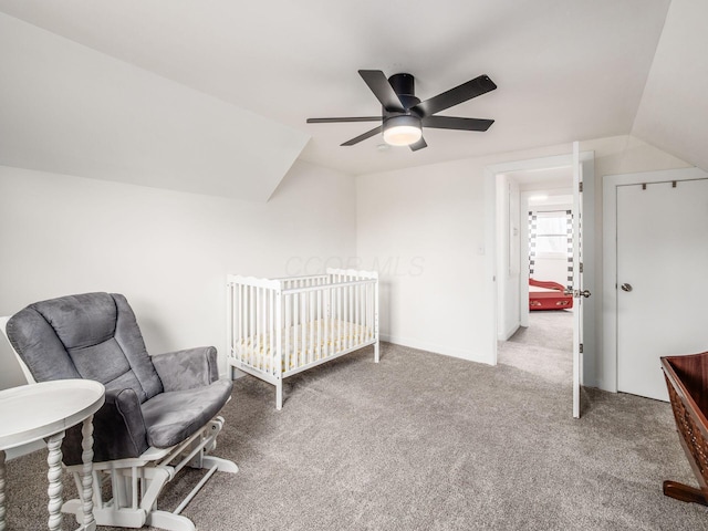 bedroom featuring vaulted ceiling, carpet floors, a ceiling fan, and baseboards