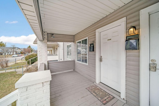 view of patio / terrace with covered porch and fence