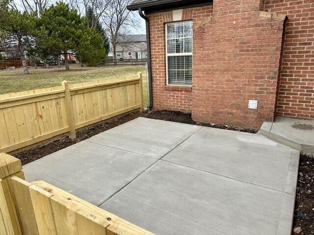 view of patio with fence