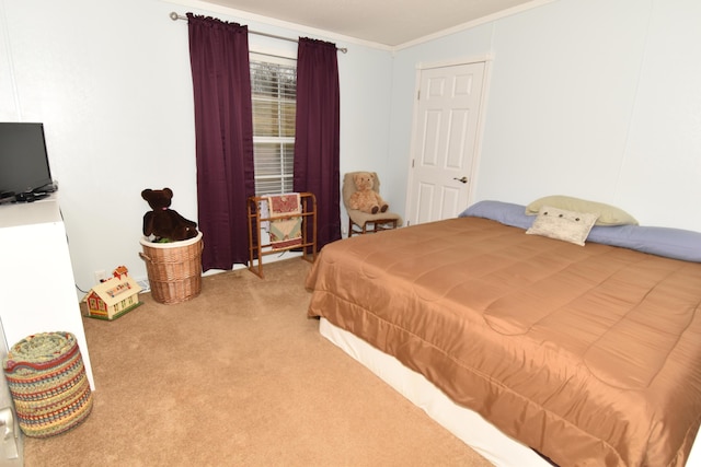 carpeted bedroom featuring crown molding