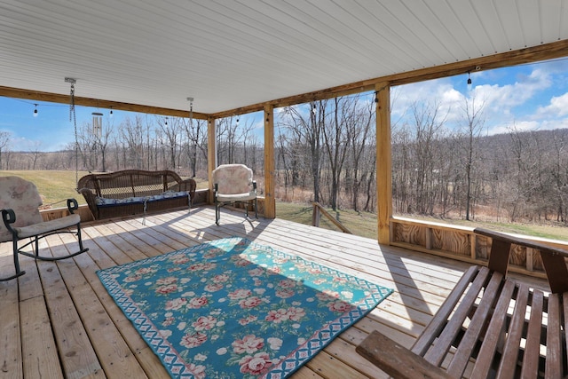 deck with a wooded view