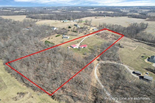 birds eye view of property featuring a rural view