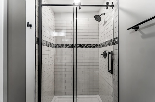 bathroom featuring a stall shower