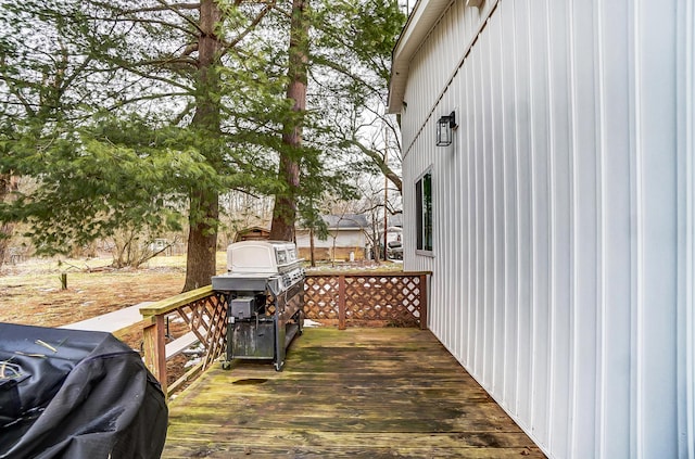 wooden deck with area for grilling