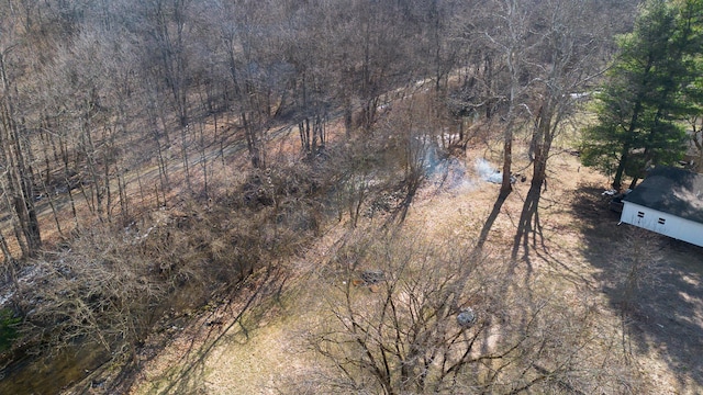 aerial view featuring a view of trees