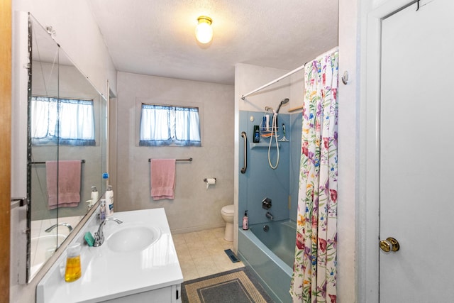 bathroom with shower / bath combination with curtain, toilet, vanity, a textured ceiling, and baseboards