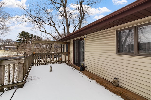 view of snow covered deck