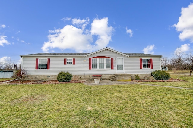 manufactured / mobile home featuring entry steps, crawl space, and a front lawn