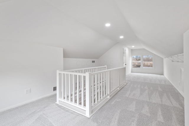 bonus room with carpet, lofted ceiling, recessed lighting, visible vents, and baseboards