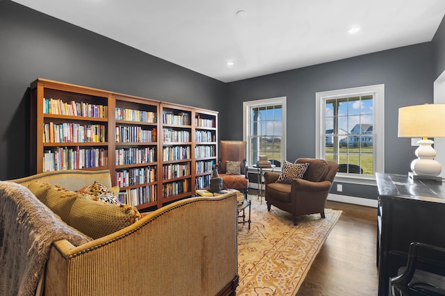 sitting room featuring recessed lighting, baseboards, and wood finished floors
