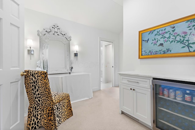 interior space featuring wine cooler and lofted ceiling