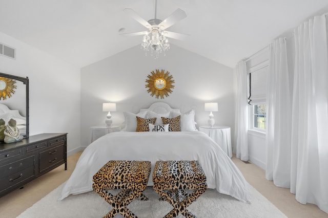 bedroom featuring lofted ceiling, a ceiling fan, visible vents, and light carpet