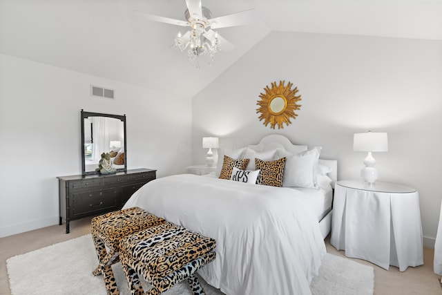 bedroom with visible vents, baseboards, lofted ceiling, light carpet, and a ceiling fan