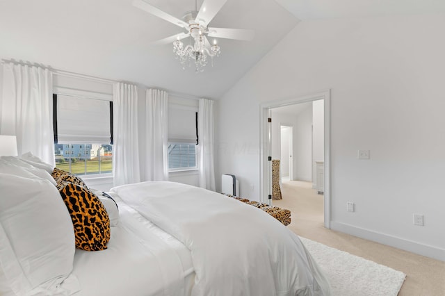 bedroom with light colored carpet, baseboards, lofted ceiling, and a ceiling fan