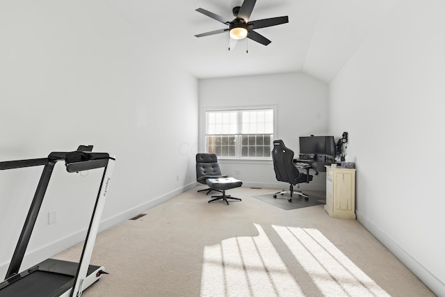 carpeted office featuring visible vents, baseboards, a ceiling fan, and vaulted ceiling