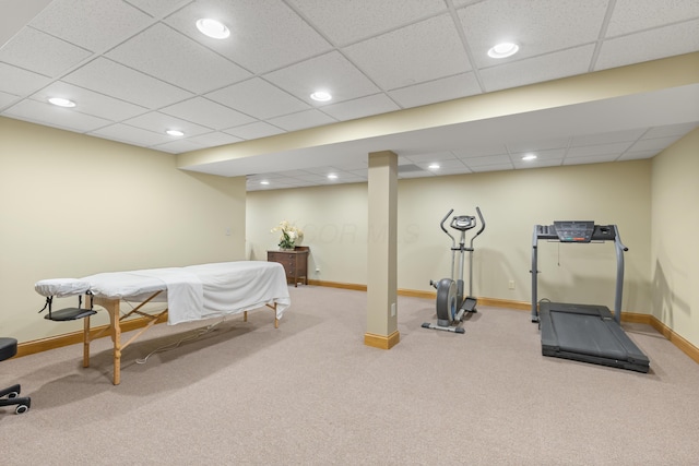 workout room featuring recessed lighting and baseboards