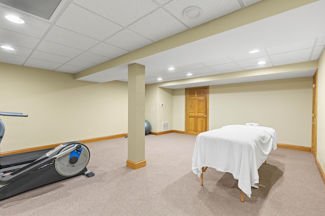 interior space featuring visible vents, recessed lighting, a paneled ceiling, and baseboards