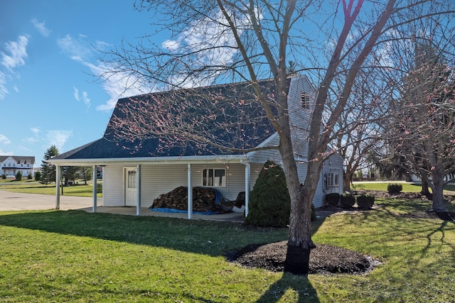 view of home's exterior featuring a yard