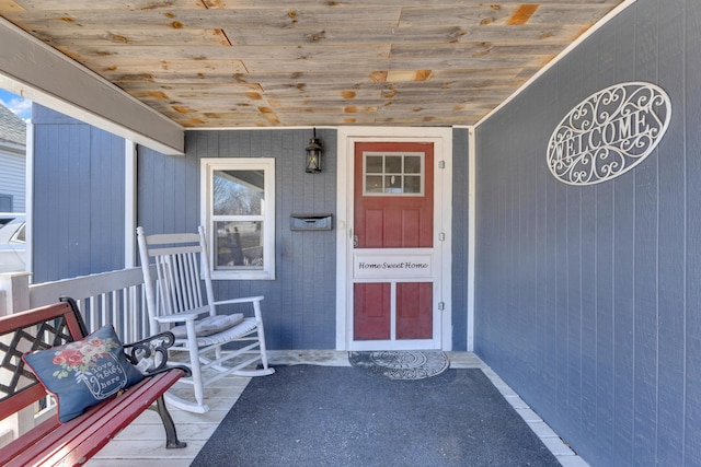 doorway to property with a porch