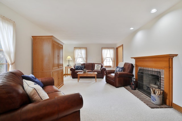 8871 Patterson Rd, Hilliard, OH 43026 - carpeted living area with a fireplace and recessed lighting