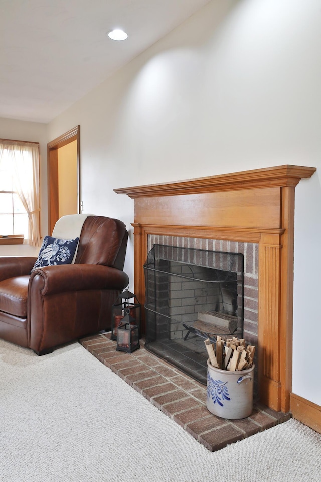 8871 Patterson Rd, Hilliard, OH 43026 - living room with carpet floors, a fireplace, and recessed lighting