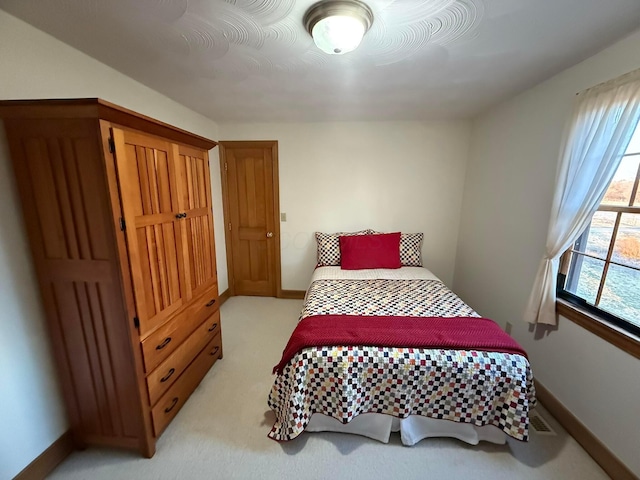 8871 Patterson Rd, Hilliard, OH 43026 - bedroom featuring light colored carpet and baseboards