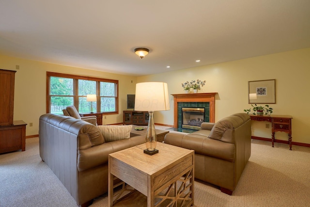 7334 Crossett Ct, Canal Winchester, OH 43110 - living room with light colored carpet, a tiled fireplace, baseboards, and recessed lighting