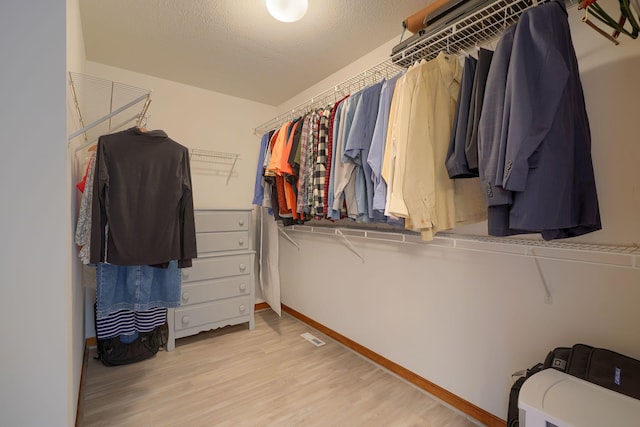 7334 Crossett Ct, Canal Winchester, OH 43110 - spacious closet featuring light wood-style floors