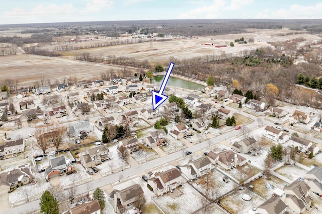 birds eye view of property with a residential view