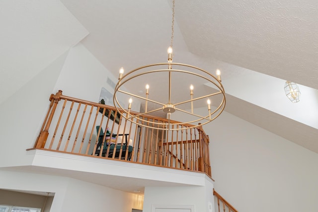 details featuring visible vents and an inviting chandelier