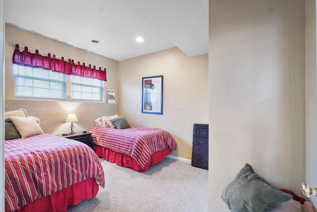 bedroom featuring visible vents, carpet floors, and baseboards