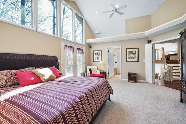 bedroom with high vaulted ceiling, recessed lighting, carpet flooring, baseboards, and access to exterior