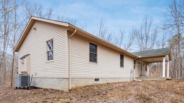 view of home's exterior with central air condition unit