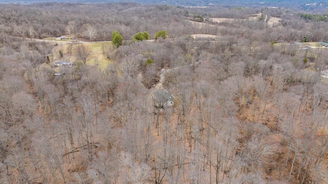 bird's eye view featuring a forest view