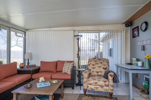 living area featuring light tile patterned floors