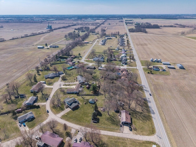 birds eye view of property featuring a rural view