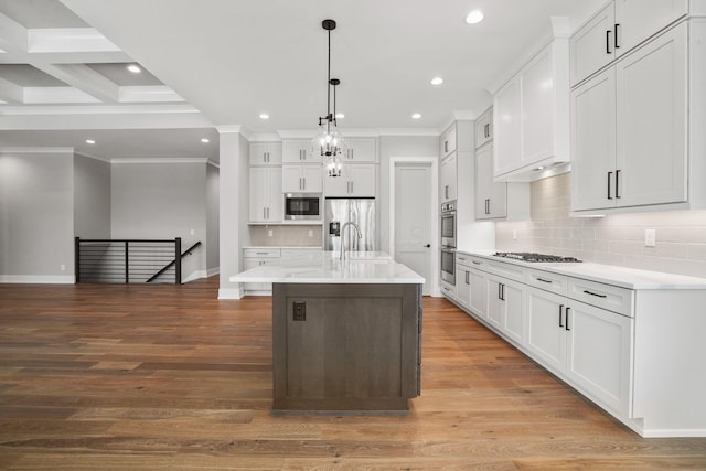 kitchen with stainless steel appliances, recessed lighting, white cabinetry, and light wood-style floors