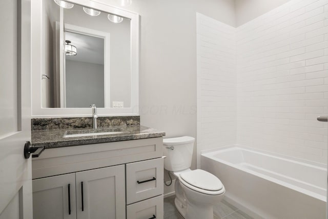 bathroom featuring  shower combination, vanity, and toilet