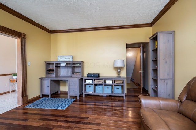 home office with baseboards, wood finished floors, ornamental molding, and a textured ceiling