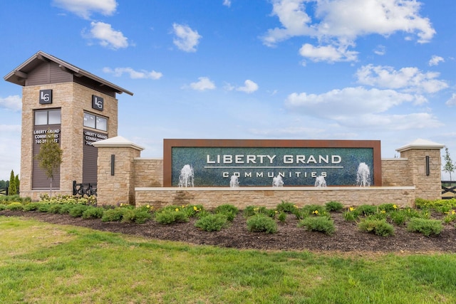 view of community sign